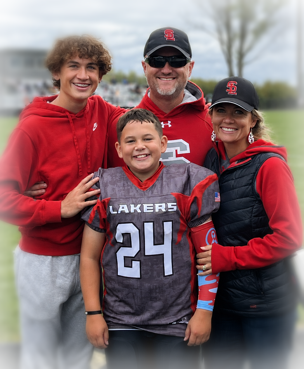 Katie Bowen with her family at a Spring Lake football event
